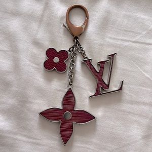 Beautiful Louis Vuitton Spring Street keychain in raspberry